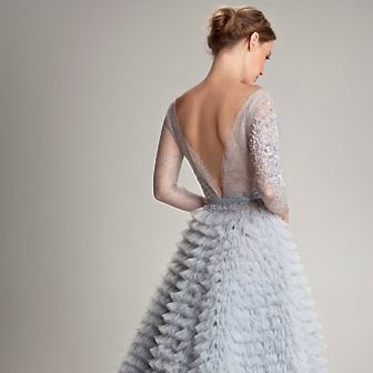 https://heyweddinglady.com/wp-content/uploads/2013/12/ruffled-wedding-dress-Tidewater-Christmas-gray-winter-wedding-inspiration-tidewater-and-tulle.jpg