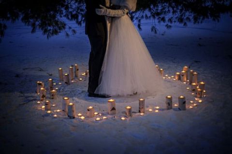 Circle of Candles in the Snow | Carla Ten Eyck Photography | Winter Chic - Cozy White and Blue Snowy Forest Wedding