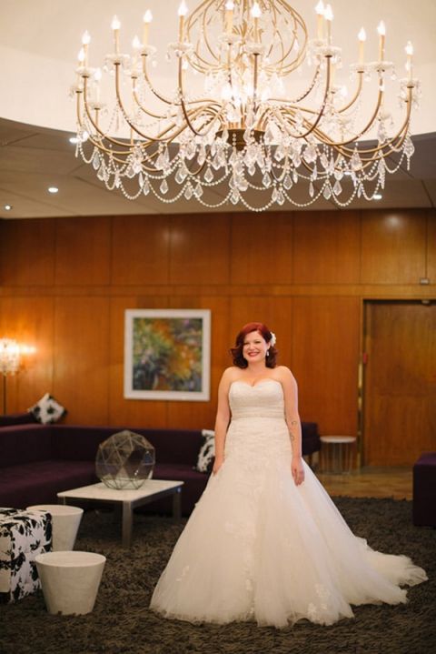 Every Bridal Suite Needs a Chandelier! | Milton Photography | See More: https://heyweddinglady.com/ruby-and-gray-wedding-with-vintage-book-details-from-milton-photography/