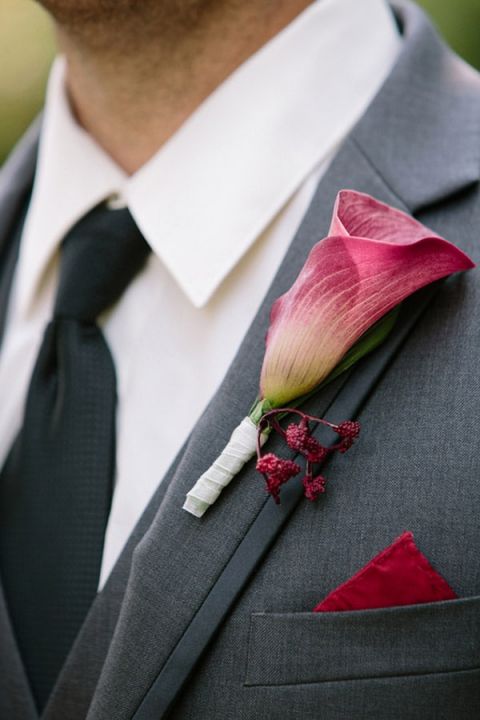 Garnet Calla Lily Boutonniere | Milton Photography | See More: https://heyweddinglady.com/ruby-and-gray-wedding-with-vintage-book-details-from-milton-photography/