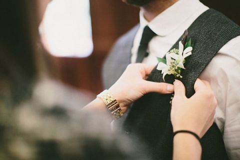 A Simple White Boutonniere | Robert J Hill Photography | See More: https://heyweddinglady.com/simple-and-elegant-grand-bohemian-hotel-wedding-from-robert-j-hill-photography/