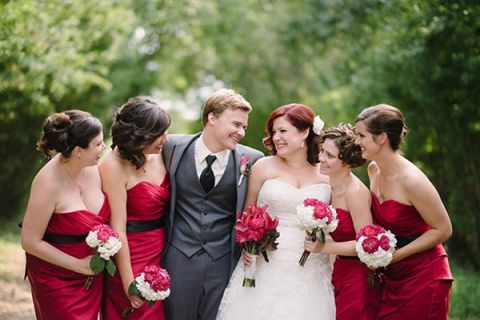 Bridesmaids in Ruby and the Man of Honor in Gray | Milton Photography | See More: https://heyweddinglady.com/ruby-and-gray-wedding-with-vintage-book-details-from-milton-photography/