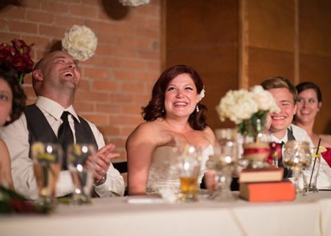 All Smiles for a Joyful Wedding Reception! | Milton Photography | See More: https://heyweddinglady.com/ruby-and-gray-wedding-with-vintage-book-details-from-milton-photography/