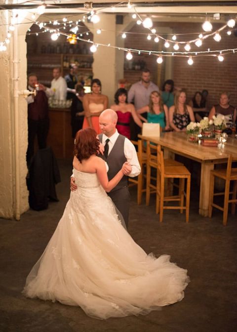 First Dance for a Romantic Industrial Reception | Milton Photography | See More: https://heyweddinglady.com/ruby-and-gray-wedding-with-vintage-book-details-from-milton-photography/