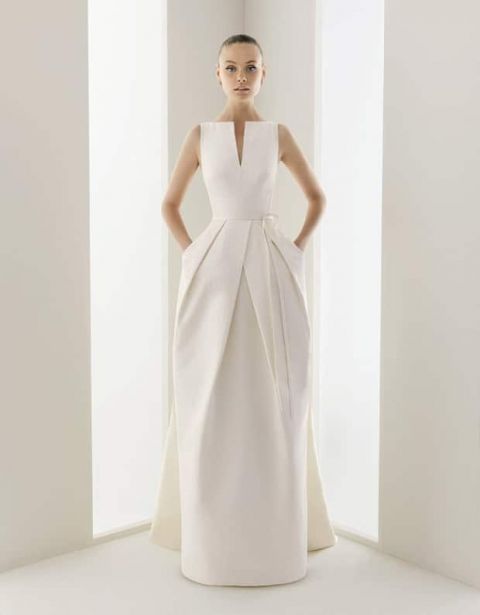 Modern, Architectural Wedding Dress by Rosa Clara | See More! https://heyweddinglady.com/fabulous-architectural-details-wedding-dress/