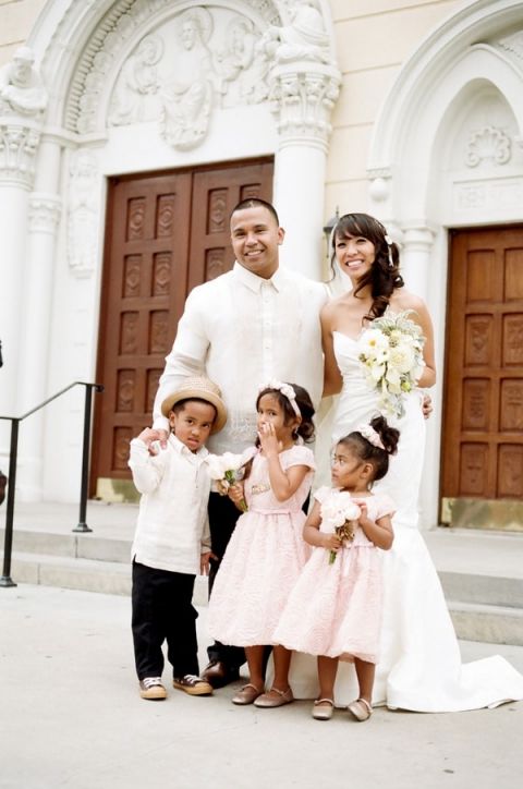 Bride and Groom with their Ring Bearer and Flower Girls in Blush and Ivory | Tikko Weddings |See More: https://heyweddinglady.com/classic-and-glamorous-blush-and-gold-socal-wedding-from-tikko-weddings/