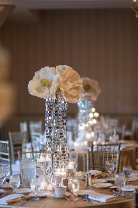 Paper Poppy Centerpieces top a Column of Glittering Crystals | Tikko Weddings |See More: https://heyweddinglady.com/classic-and-glamorous-blush-and-gold-socal-wedding-from-tikko-weddings/