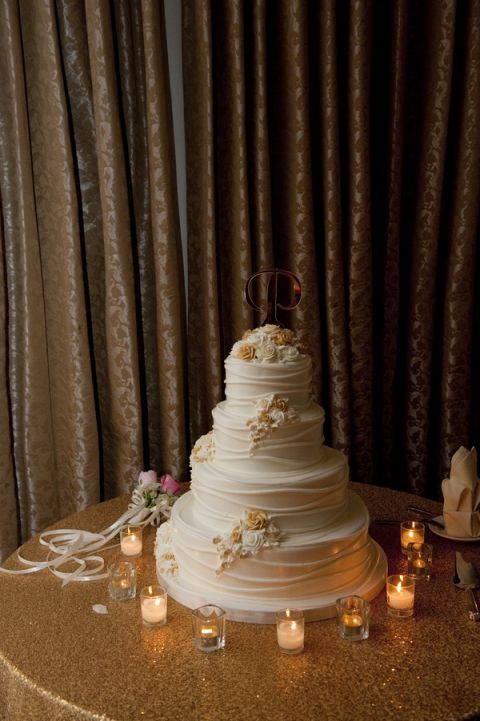 Glamorous Ivory and Gold Wedding Cake | Tikko Weddings |See More: https://heyweddinglady.com/classic-and-glamorous-blush-and-gold-socal-wedding-from-tikko-weddings/