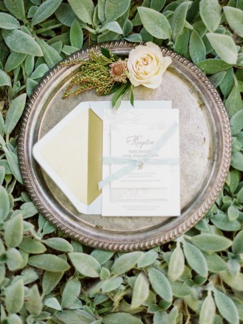Letterpress Wedding Invitation and a Vintage Silver Tray on a Bed of Greenery | Michele Beckwith Photography | See More! https://heyweddinglady.com/down-the-garden-path-a-forest-green-and-peach-wedding/
