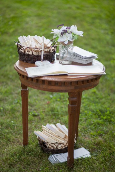 Elegant Fans and Rustic Blooms for an Outdoor Summer Manor Wedding | Craig Hodge Photography | See More! https://heyweddinglady.com/elegant-simplicity-in-royal-purple-from-craig-hodge-photography/