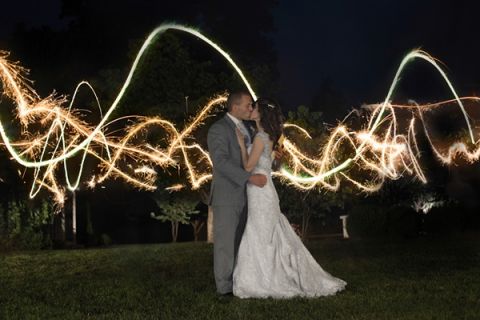 A Stunning Sparkler Wedding Portrait | Craig Hodge Photography | See More! https://heyweddinglady.com/elegant-simplicity-in-royal-purple-from-craig-hodge-photography/