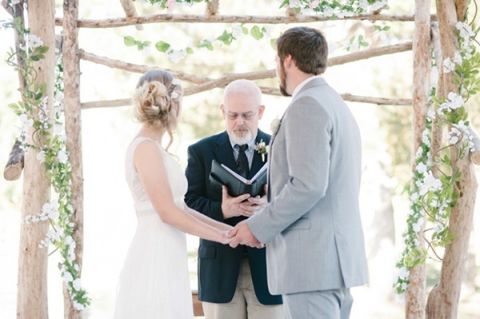A Sweet Spring Ceremony Backdrop | Stephanie Mballo Photography | See More! https://heyweddinglady.com/falling-petals-floral-lace-trends-spring/