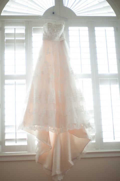 Romantic Vintage Blush and Lace Wedding Dress | Captured by Belinda | See more! https://heyweddinglady.com/ethereal-beach-wedding-after-the-storm-from-captured-by-belinda/