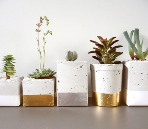 Gold Dipped Cement Succulent Planters | Oh, Laszlo! | See More! https://heyweddinglady.com/natural-earthy-wedding-inspiration-in-terra-cotta-gold-green/