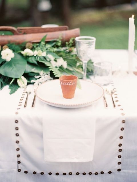 Rustic White, Green and Terra Cotta Place Setting | Taylor Lord Photography | See More! https://heyweddinglady.com/natural-earthy-wedding-inspiration-in-terra-cotta-gold-green/