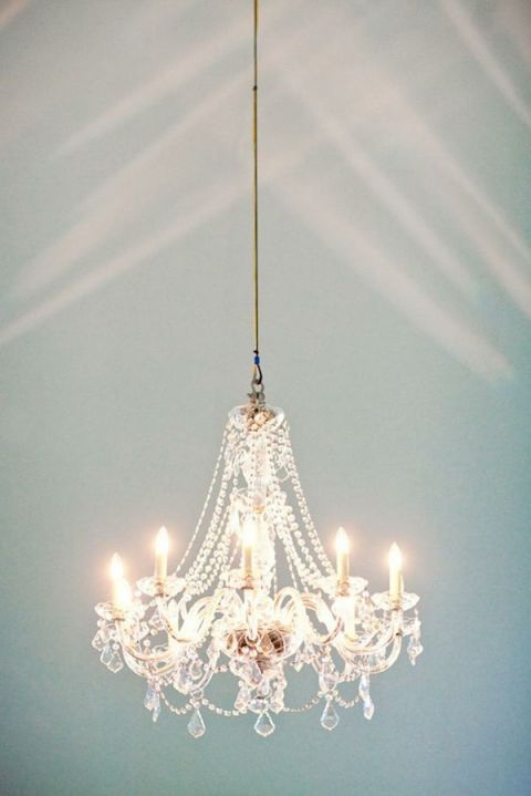 Dreamy Powder Blue Wedding Canopy with a Crystal Chandelier | Tennison Photography | See More! https://heyweddinglady.com/secrets-of-event-lighting-theres-no-such-thing-as-too-many-chandeliers/