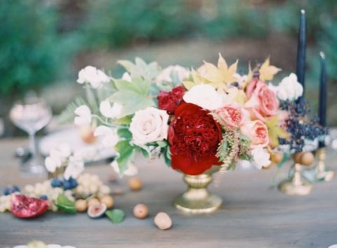 Rich Berry Red Centerpiece | Odalys Mendez Photography | See More! https://heyweddinglady.com/farm-table-luxe-organic-wedding-inspiration/