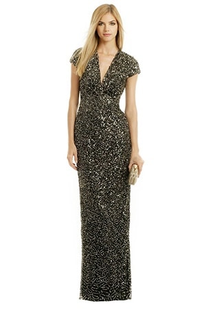 Nicole Miller Black and Gold Sequin Wedding Dress | See More! https://heyweddinglady.com/the-ultimate-guide-to-sparkling-metallic-dresses-for-your-wedding/