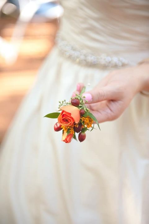 Boutonniere with Orange Roses and Berries | Bit of Ivory Photography | Traditional Autumn Wedding in Eggplant and Orange