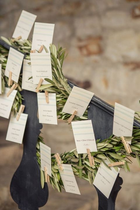 Greenery Garland Escort Cards | Carlie Statsky Photography | Light and Shadow - Still Life Inspired Fine Art Wedding Styling in Moody Winter Shades