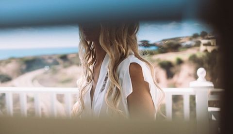 Glimpse of the Bride Getting Ready | Vitaly M Photography | Black Tie Coastal Wedding with Classic Beach Details