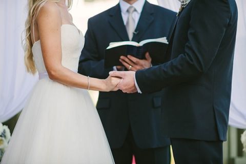 Exchanging Vows in a Seaside Ceremony | Vitaly M Photography | Black Tie Coastal Wedding with Classic Beach Details