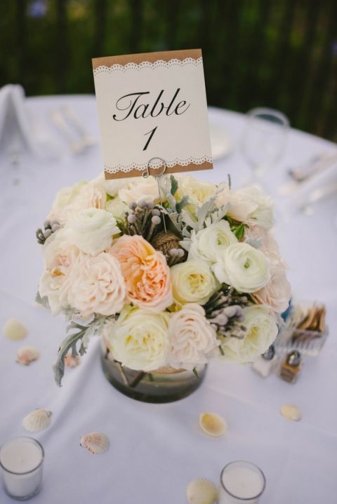 Chic Neutral Centerpieces | Vitaly M Photography | Black Tie Coastal Wedding with Classic Beach Details