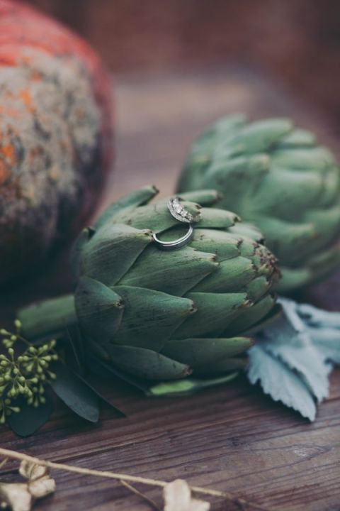 Bride and Grooms Rings on a Foraged Farm Table | Mintwood Photo Co. | A Forest Fairy Tale Anniversary Shoot with a Bohemian Picnic