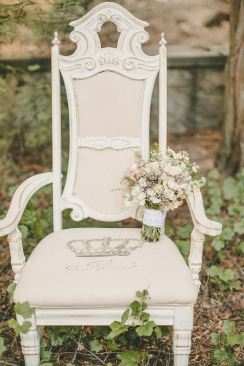 Vintage Shabby Chic Chair with a Pastel Wildflower Bouquet