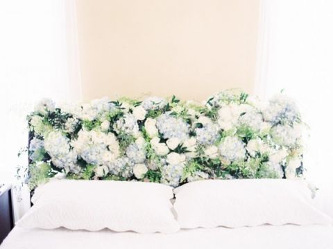 A Blooming Headboard of Spring Flowers | Orange Photographie and Beargrass Gardens | Blissful Bridal Shoot - Getting Ready for the Wedding Day - https://heyweddinglady.com/blissful-bridal-shoot-getting-ready-for-the-wedding-day/