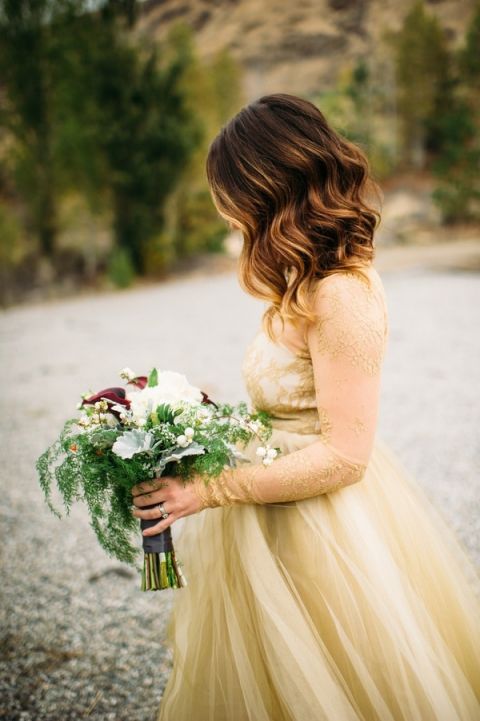 Gorgeous Gold Lace Wedding Dress and Wild Winter Bouquet | Tonie Christine Photography | Starting a New Adventure with A Surprise Vow Renewal - https://heyweddinglady.com/starting-a-new-adventure-with-a-surprise-vow-renewal/