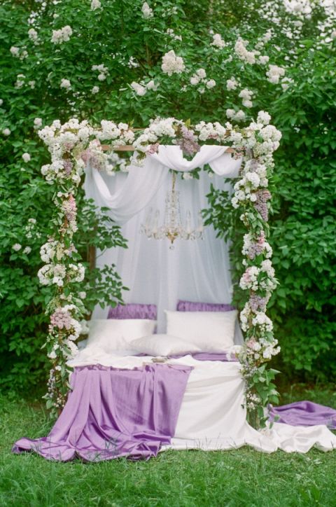 Canopy Bed Draped in Floral Garlands | Warmphoto | Sleeping Beauty - An Enchanted Bridal Morning