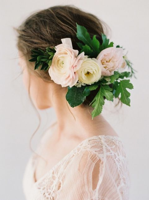 Romantic Bridal Updo with a Delicate Floral Headpiece