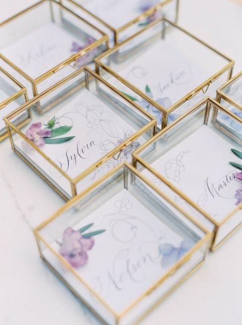 Gold and Crystal Escort Cards with Pressed Flowers | Sally Pinera Photography | https://heyweddinglady.com/spring-watercolor-wedding-inspiration-lavender-sage-green/