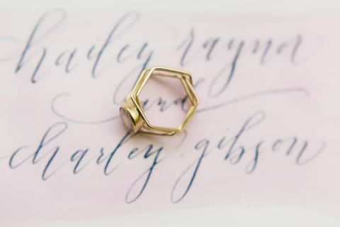 Geometric Gold Engagement Ring on a Watercolor Background | Emily Sacco Photography | https://heyweddinglady.com/spring-watercolor-wedding-inspiration-lavender-sage-green/