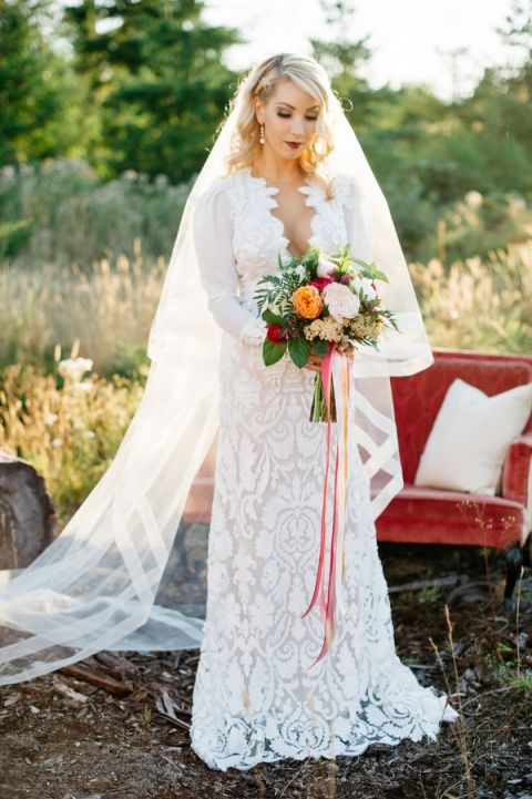 Modern Long Sleeve Lace Wedding Dress with a Colorful Bouquet