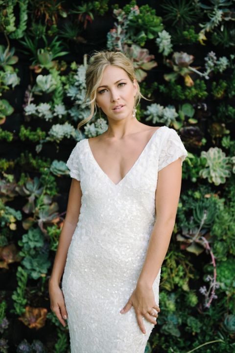 Gorgeous Modern Bride in a Sequin Wedding Dress before a Succulent Wall