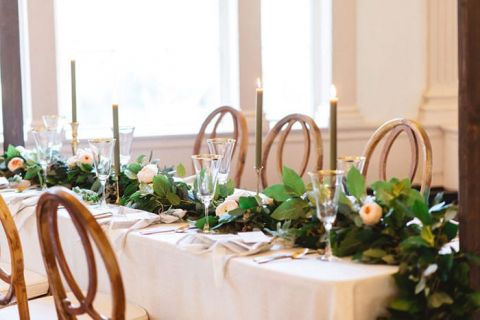 Elegant Gold and Ivory Head Table with a Greenery and Floral Runner