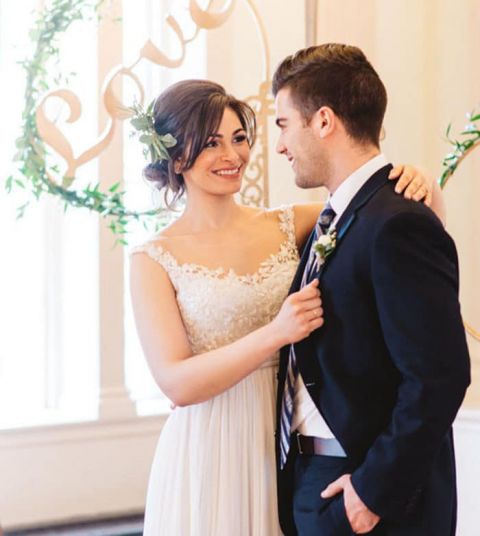 Fun Wedding Photo Booth Backdrop with Elegant Gold Signs