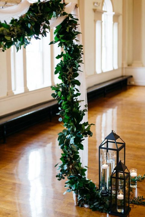Ceremony Draped in Greenery with Vintage Lanterns