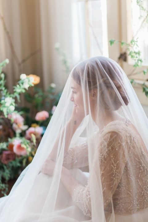 Beaded Long Sleeve Wedding Dress with an Ethereal Veil