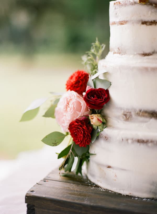 Rustic Wedding Cake With Red And Pink Flowers Emily Katharine