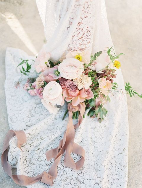 Boho Lace Wedding Dress with a Desert Sunset Inspired Bouquet