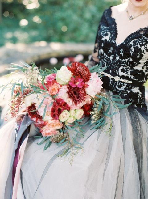 Bold Black  Wedding  Dress  and Fall Flowers  Hey Wedding  Lady