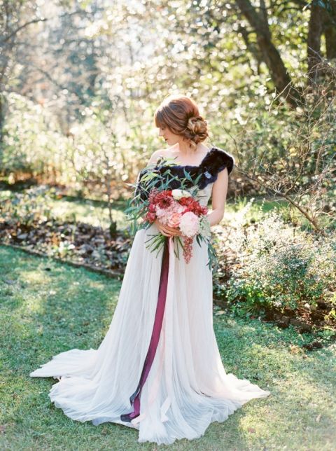 Bold Black  Wedding  Dress  and Fall Flowers  Hey Wedding  Lady