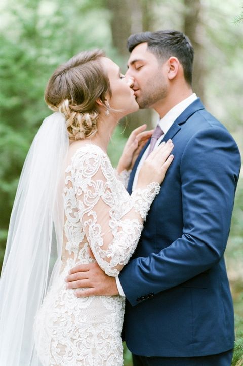 Romantic Wedding Kiss in the Woods