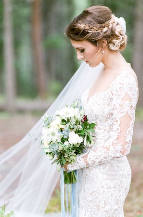Bride with a Long Sleeve Lace Dress and Organic Bouquet