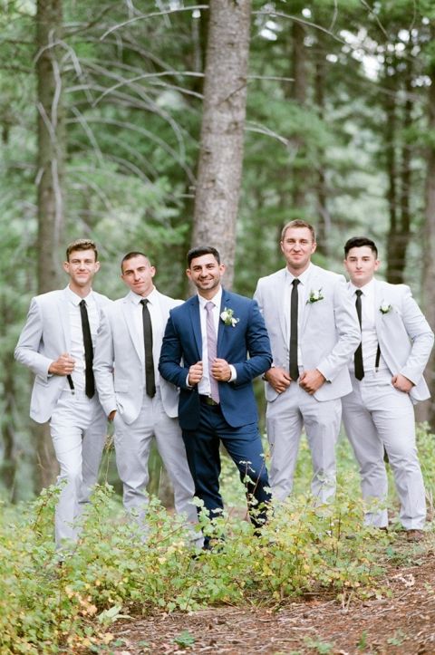 Groom in Navy Blue with Light Gray Suits for the Groomsmen