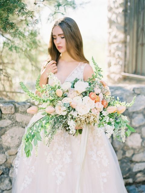 Enchanting Peach Bouquet with a Spring Wedding Dress