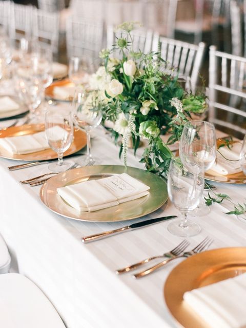 Gold and White Wedding Head Table with Spring Greenery